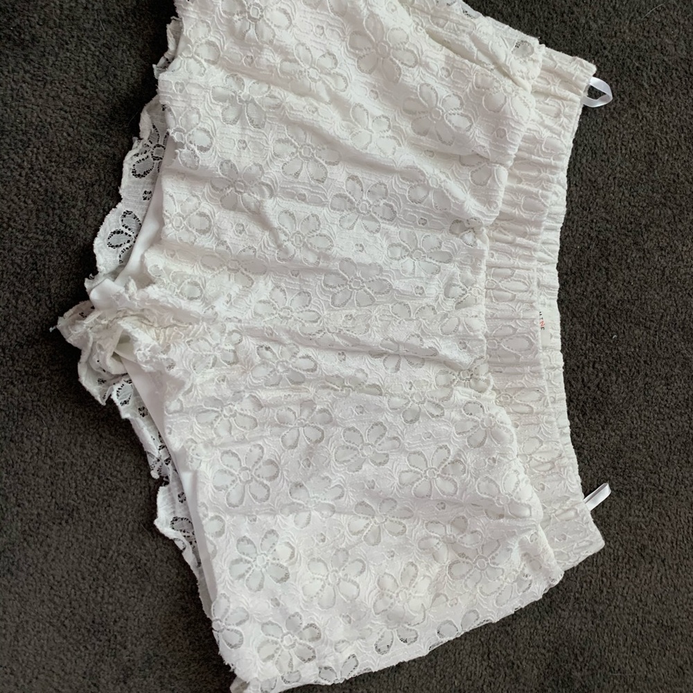 White floral high rise shorts